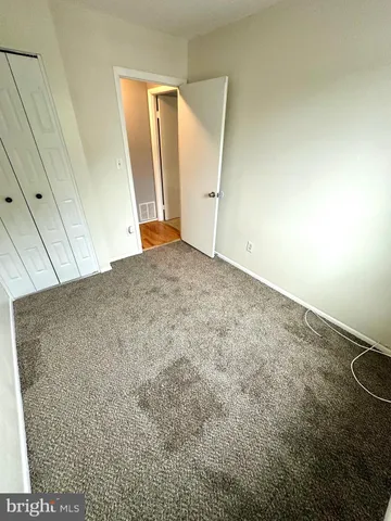 an empty room with a natural light