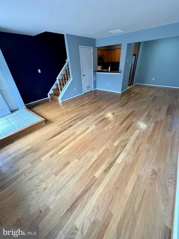 a view of a living room and bathroom