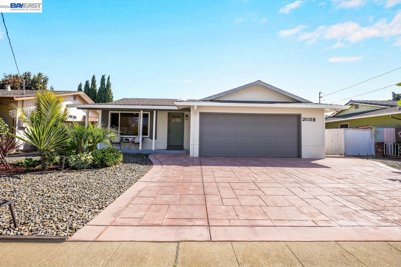 2038 Hartnell Street Union City, CA 94587 - Photo 1 of 1 a front view of a house with a yard and garage