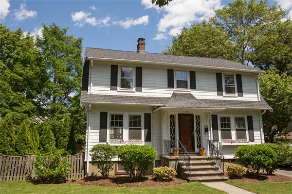 407 Weston Road Wellesley, MA 02482 - Photo 1 of 21 front view of a house with a yard