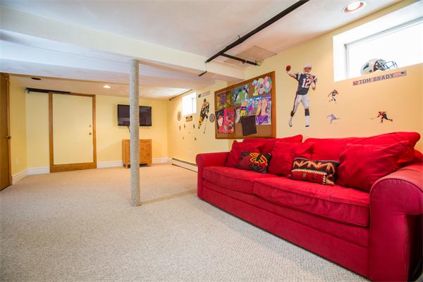 407 Weston Road Wellesley, MA 02482 - Photo 17 of 21 a bed room with a bed and a couch