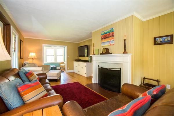 407 Weston Road Wellesley, MA 02482 - Photo 8 of 21 a living room with furniture fireplace and window