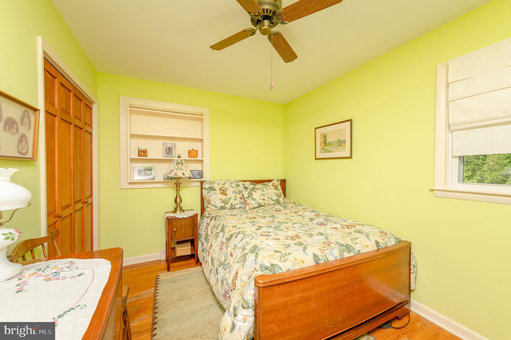 675 Gentry Drive Lancaster, PA 17603 - Photo 20 of 38 a bed sitting in a bedroom next to a window