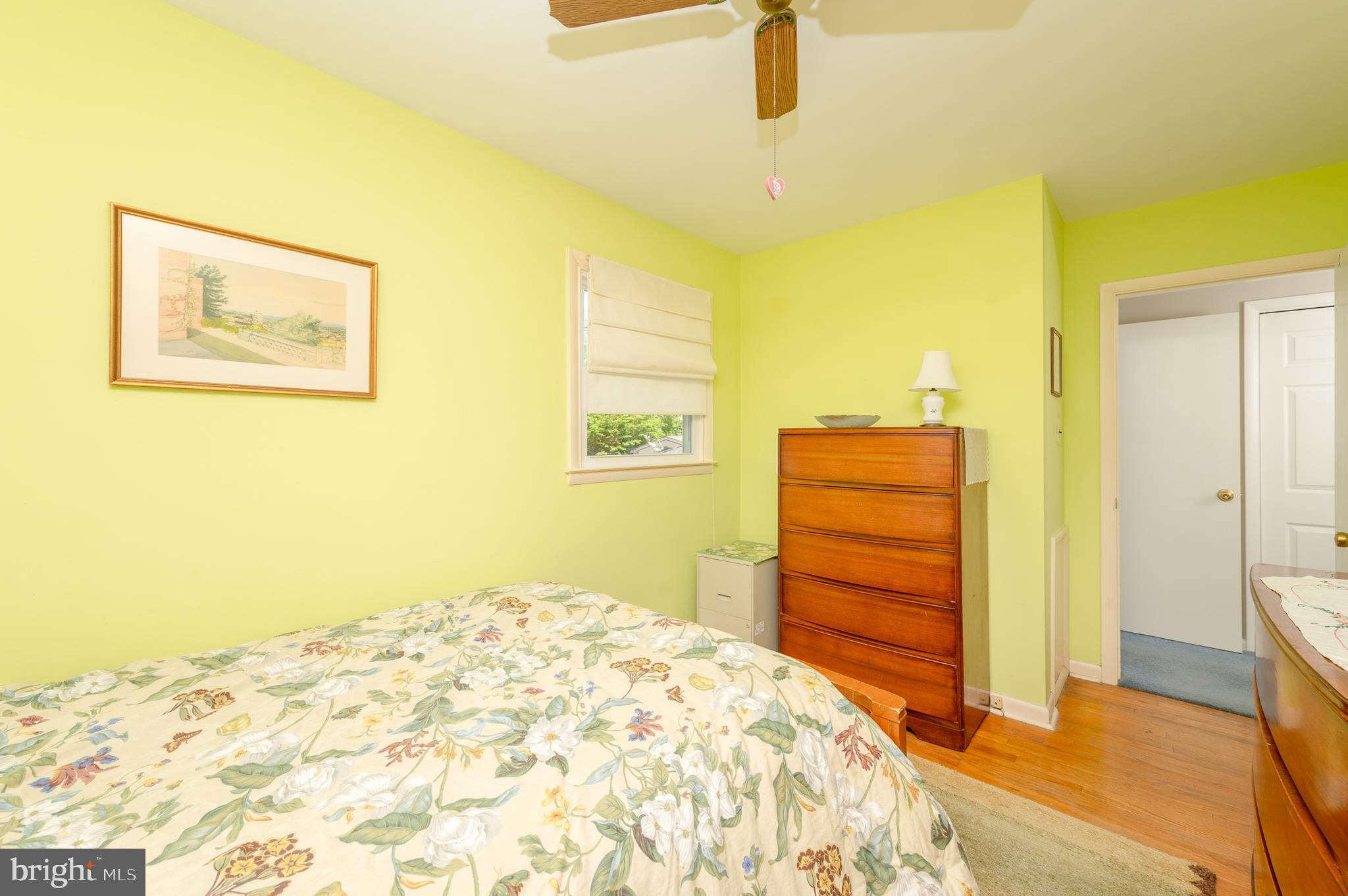 675 Gentry Drive Lancaster, PA 17603 - Photo 21 of 38 a bedroom with a bed and wooden floor