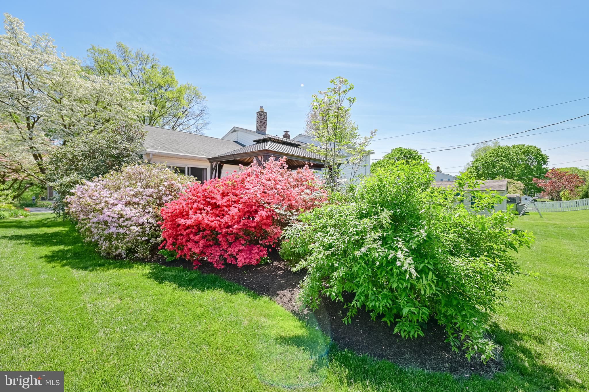 675 Gentry Drive Lancaster, PA 17603 - Photo 27 of 38 a pink flowers in front of the house