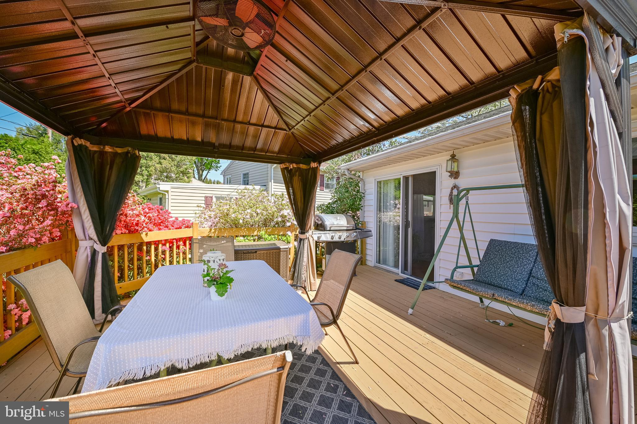 675 Gentry Drive Lancaster, PA 17603 - Photo 31 of 38 an outdoor sitting area with couch and wooden floor