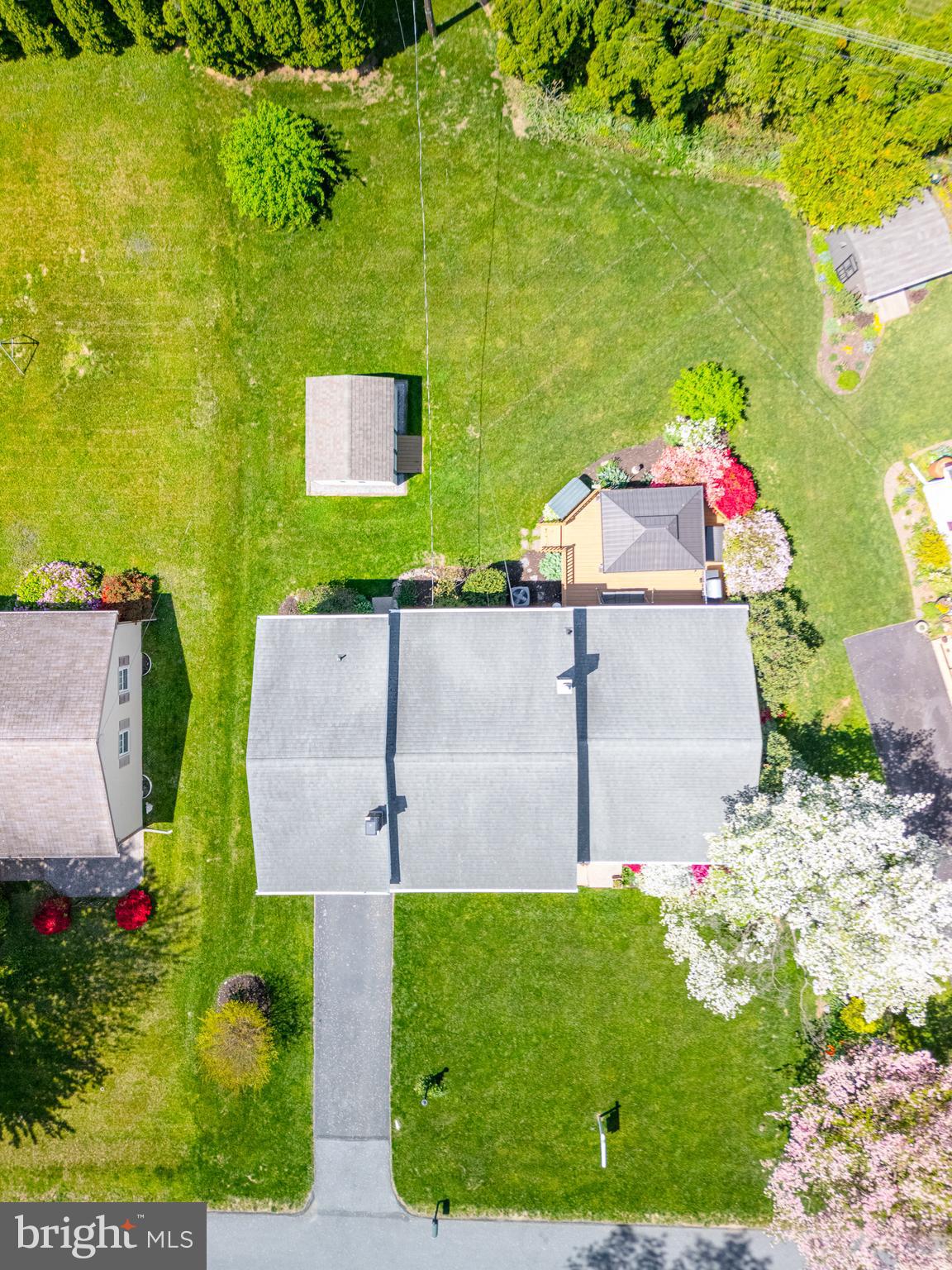 675 Gentry Drive Lancaster, PA 17603 - Photo 33 of 38 an aerial view of a house with swimming pool and garden