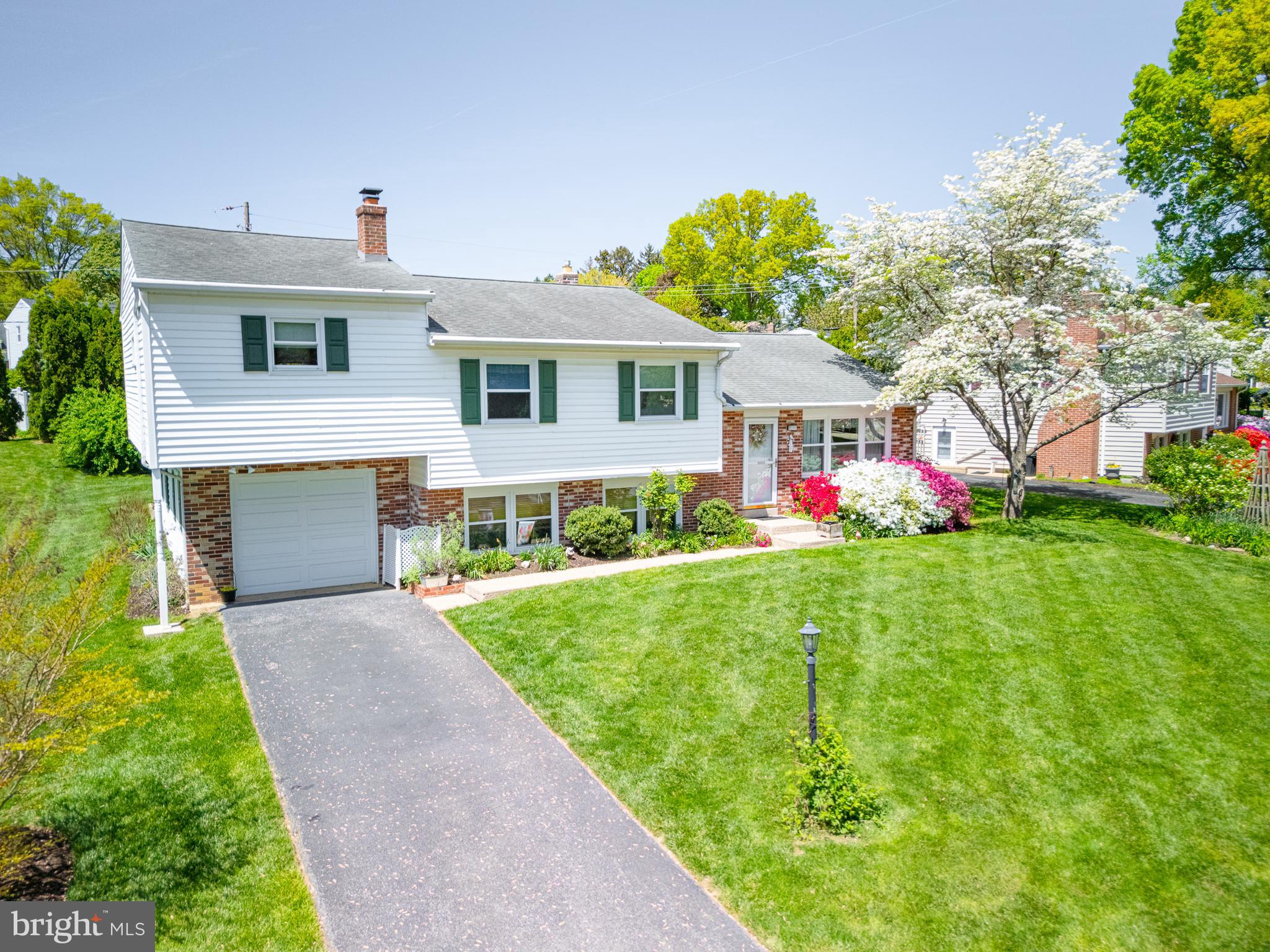 675 Gentry Drive Lancaster, PA 17603 - Photo 5 of 38 a front view of house with yard and green space