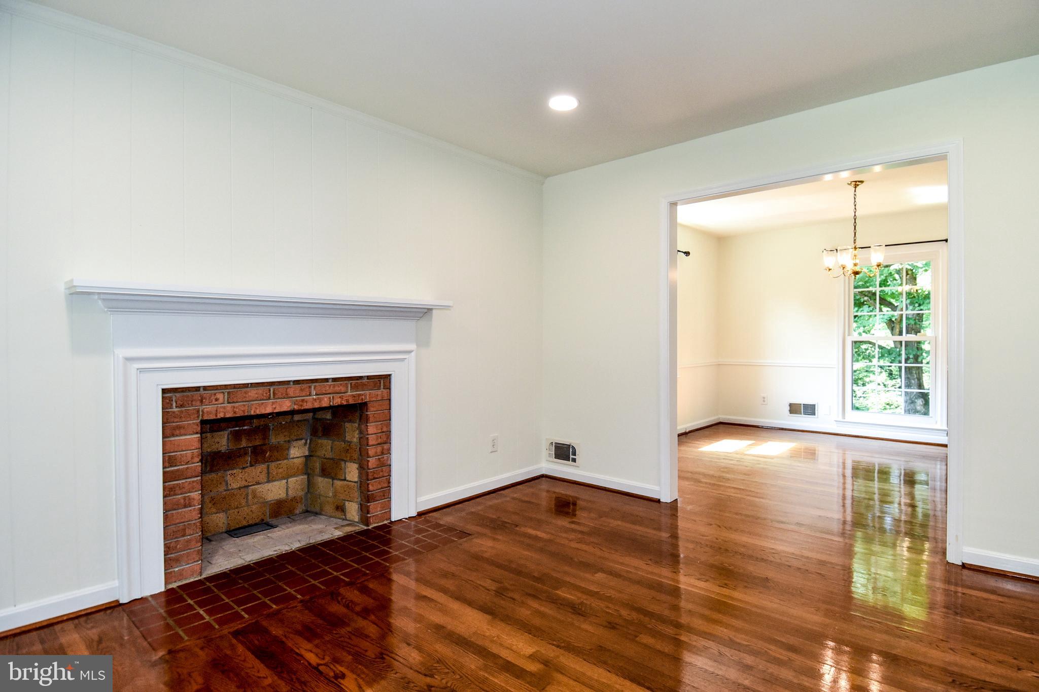 7513 Sebago Road Bethesda, MD 20817 - Photo 12 of 48 Living room with wood burning fireplace
