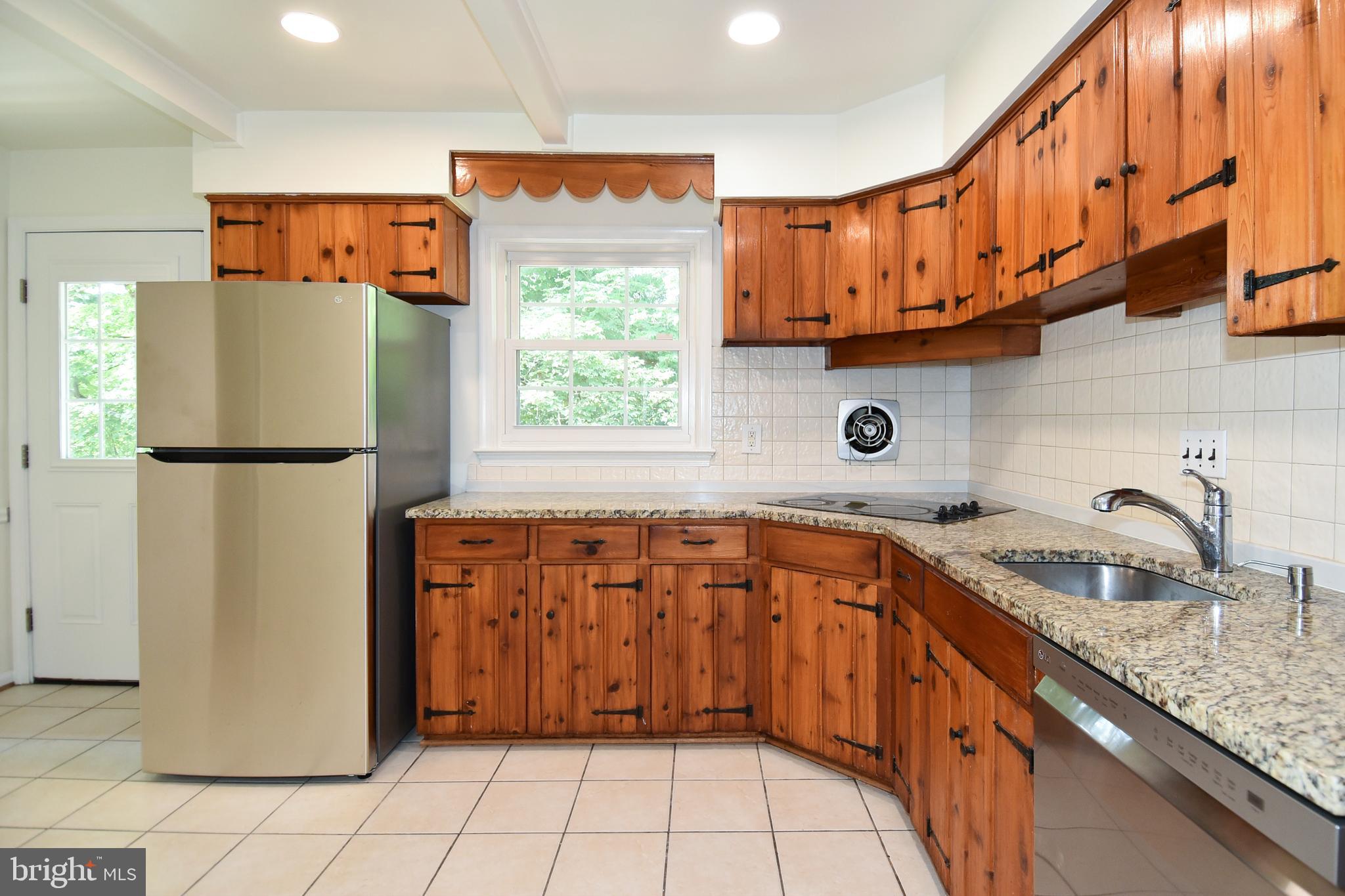 7513 Sebago Road Bethesda, MD 20817 - Photo 15 of 48 Kitchen with SS appliances
