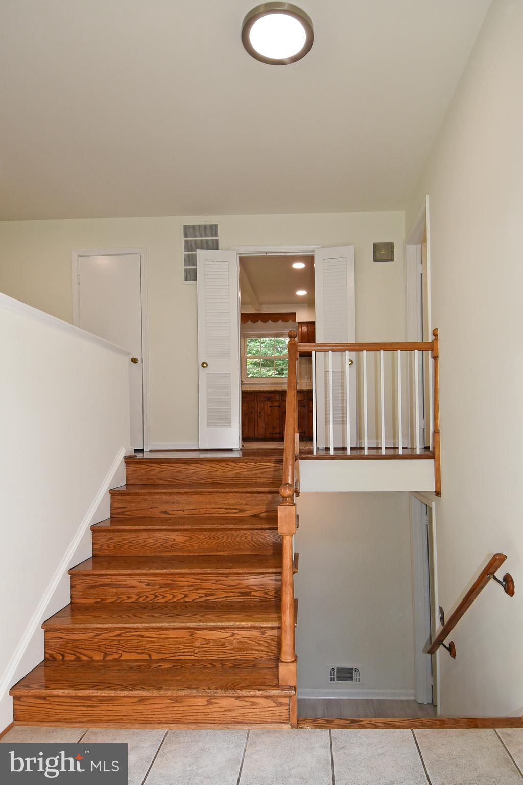 7513 Sebago Road Bethesda, MD 20817 - Photo 6 of 48 Foyer entrance stairs