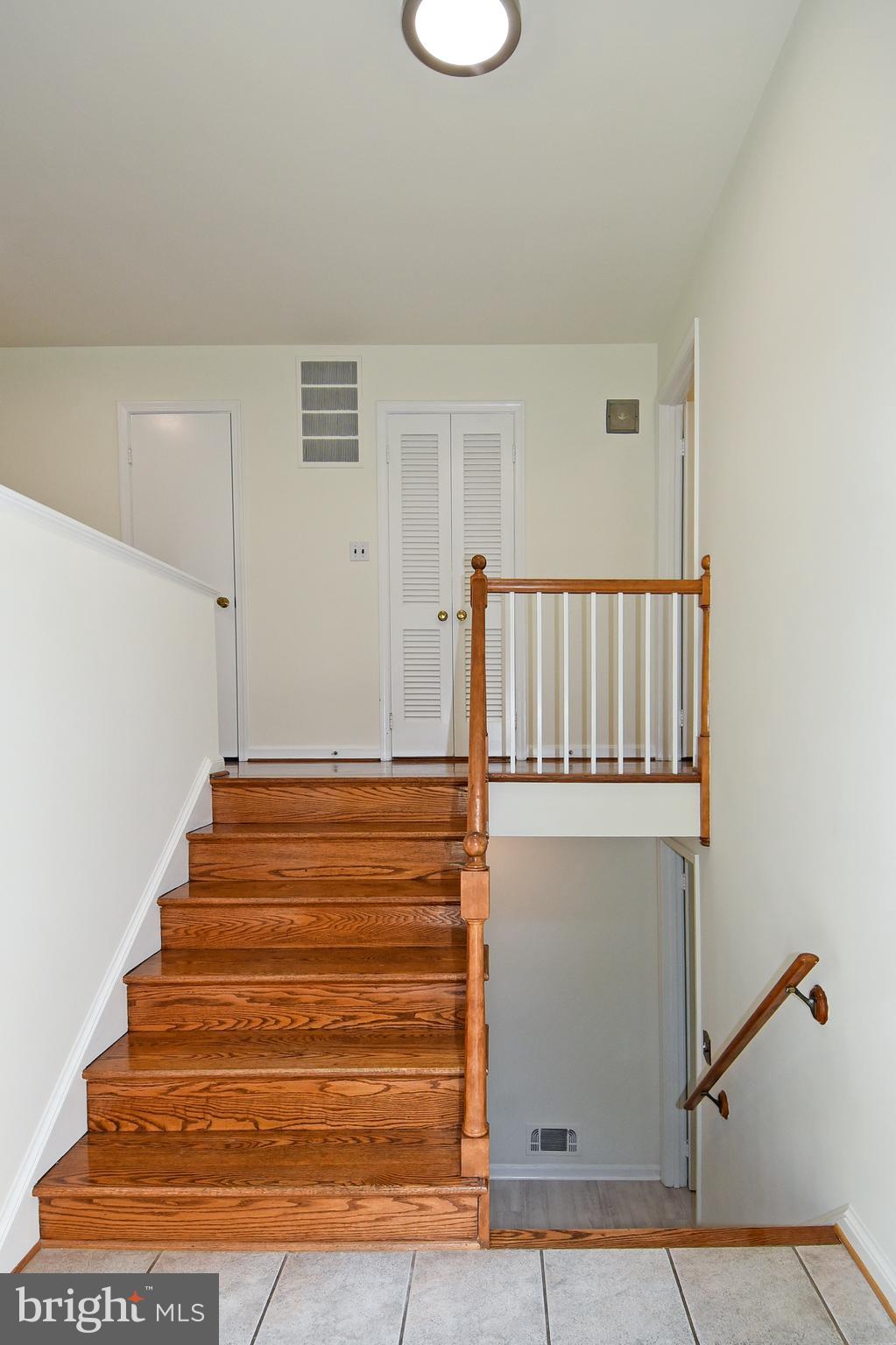 7513 Sebago Road Bethesda, MD 20817 - Photo 7 of 48 Foyer entrance stairs