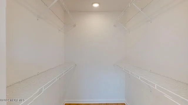 a view of small space with racks on the wall