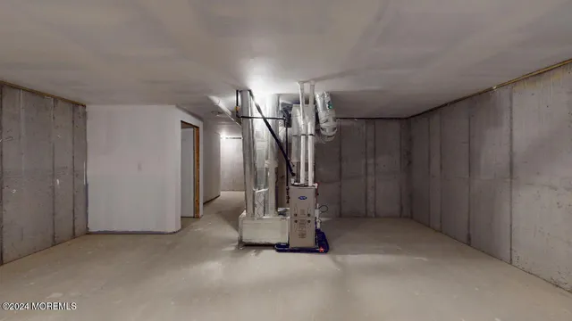 a view of a hallway with stairs