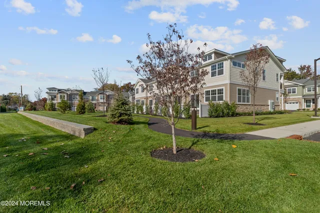 a view of swimming pool with seating area