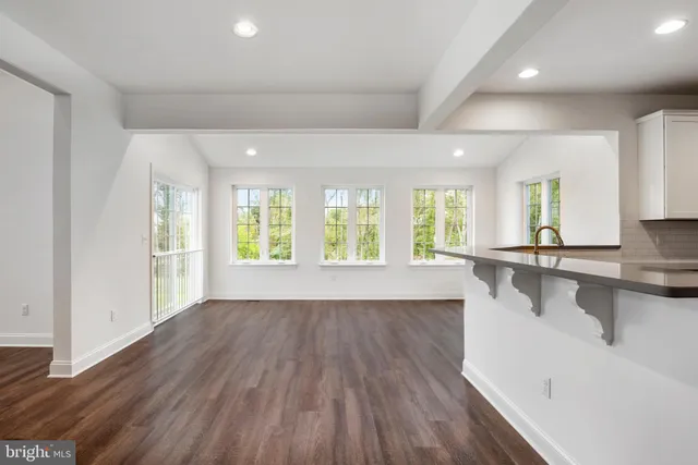 a view of a hallway with staircase