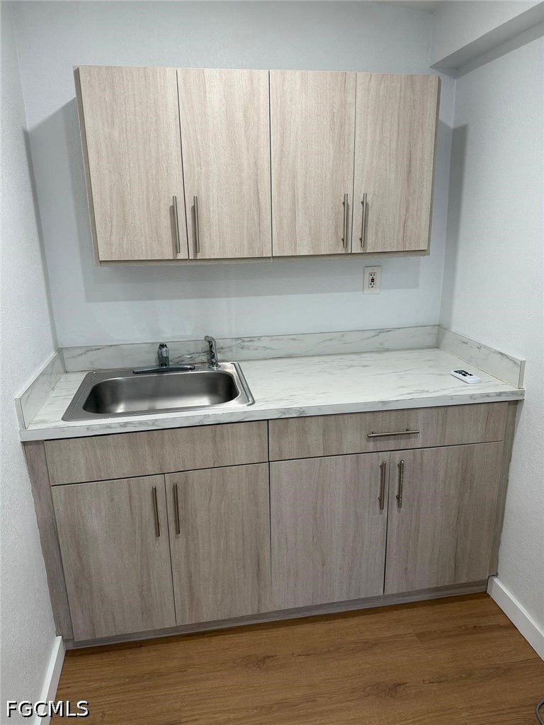 19360 Southwest 116th Avenue Miami, FL 33157 - Photo 4 of 4 a kitchen with a sink and cabinets