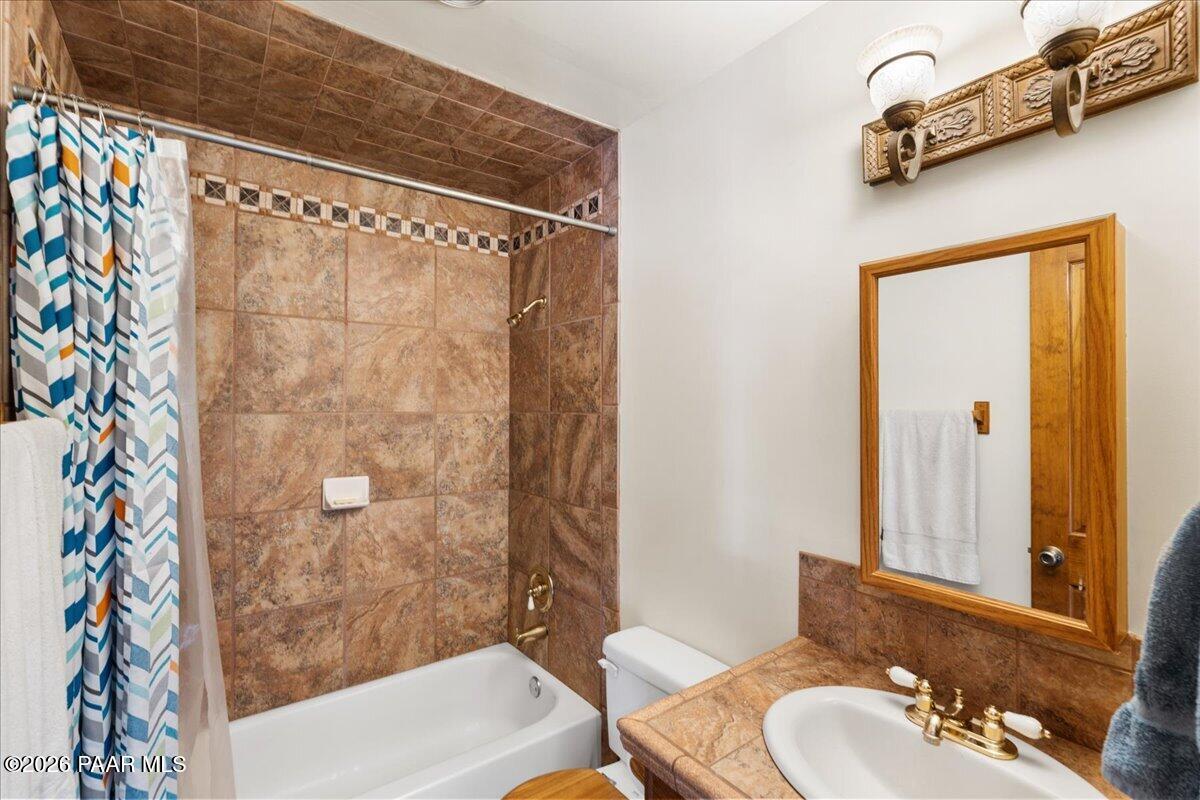 49 Norma Way Ash Fork, AZ 86320 - Photo 14 of 26 a bathroom with a sink and a mirror