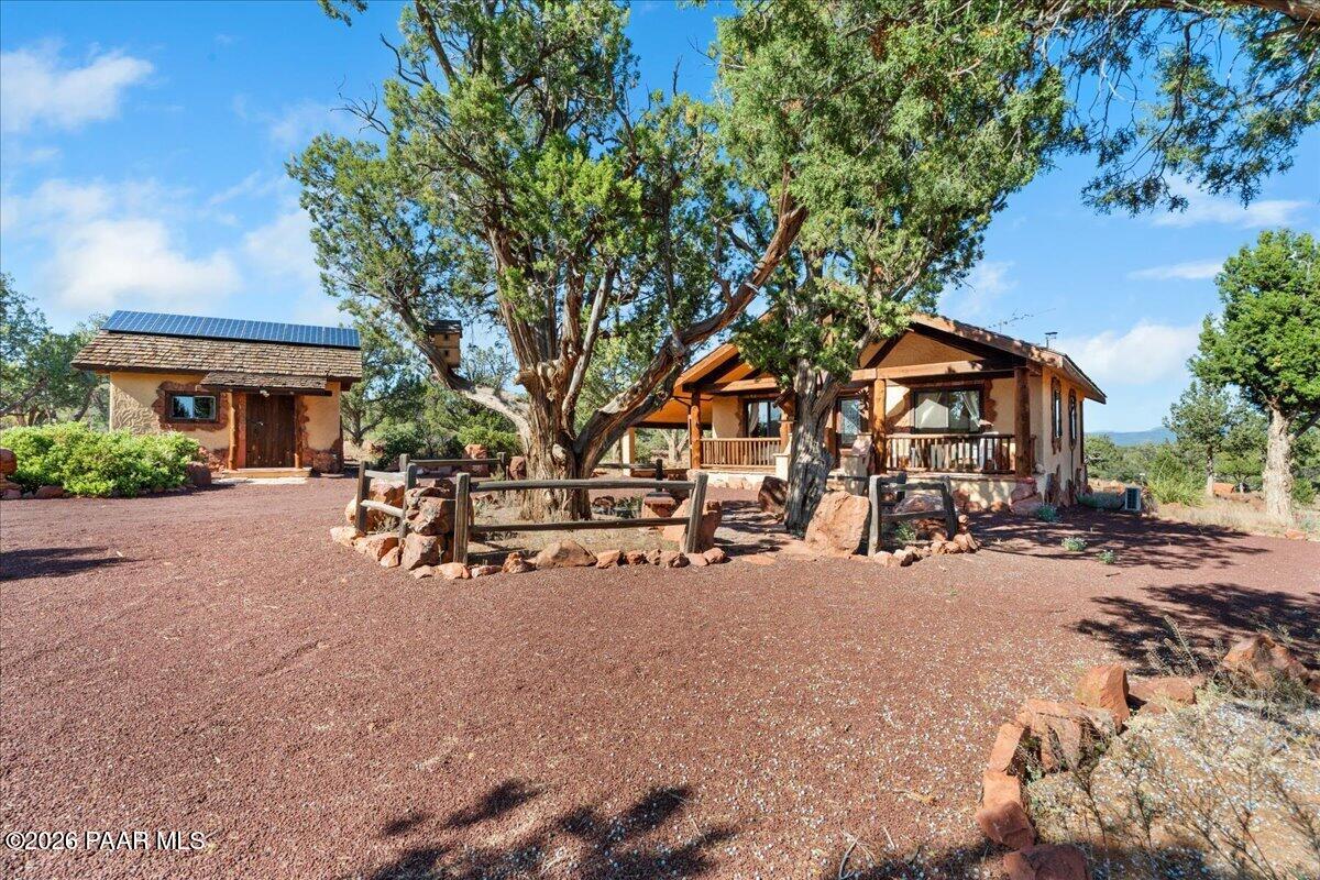 49 Norma Way Ash Fork, AZ 86320 - Photo 2 of 26 front view of a house with a tree