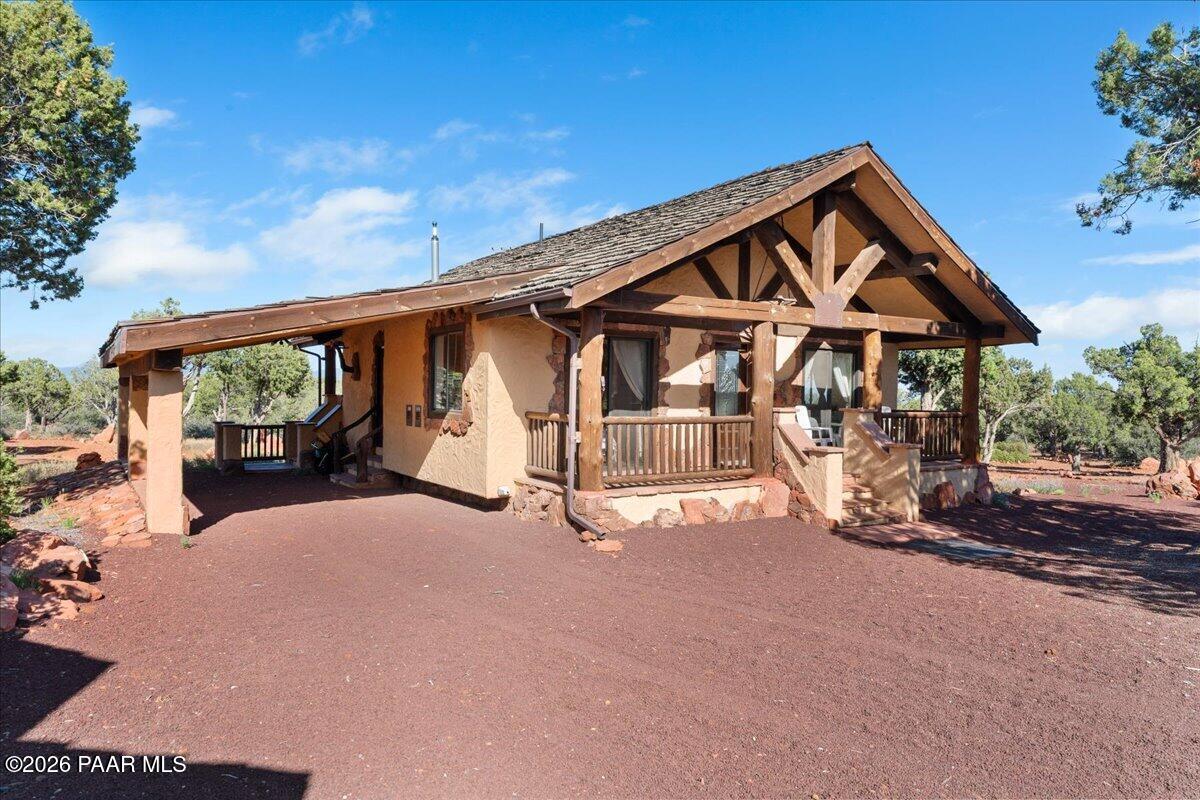 49 Norma Way Ash Fork, AZ 86320 - Photo 3 of 26 front view of a house with a porch