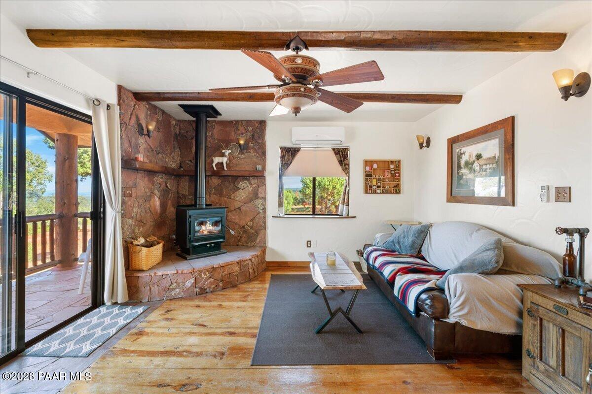 49 Norma Way Ash Fork, AZ 86320 - Photo 8 of 26 a living room with furniture and a fireplace