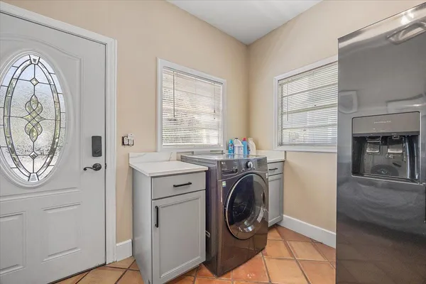 a view of washer and dryer in a utility room