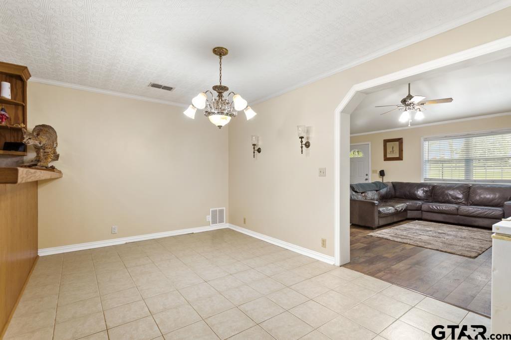 448 North Hill Road Tyler, TX 75706 - Photo 11 of 30 a living room with furniture and a chandelier