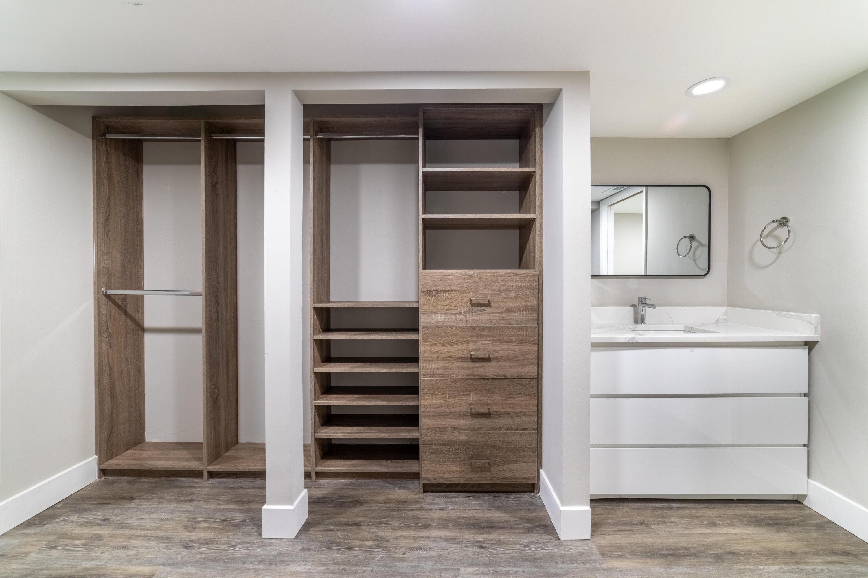 2517 Presidential Way, Unit B West Palm Beach, FL 33401 - Photo 22 of 45 a bathroom with a sink and a mirror