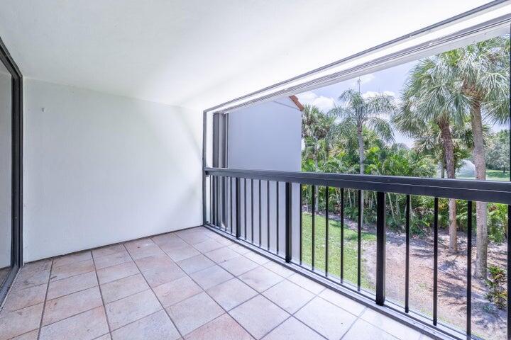 2517 Presidential Way, Unit B West Palm Beach, FL 33401 - Photo 27 of 45 a view of a room with a large window