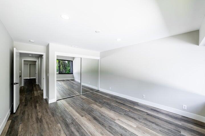 2517 Presidential Way, Unit B West Palm Beach, FL 33401 - Photo 29 of 45 wooden floor in an empty room