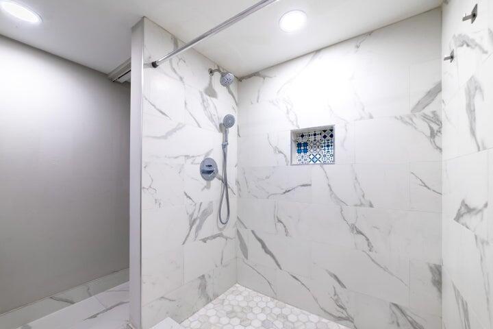 2517 Presidential Way, Unit B West Palm Beach, FL 33401 - Photo 31 of 45 a bathroom with a shower