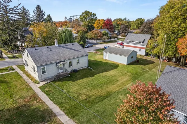 an aerial view of a house with garden