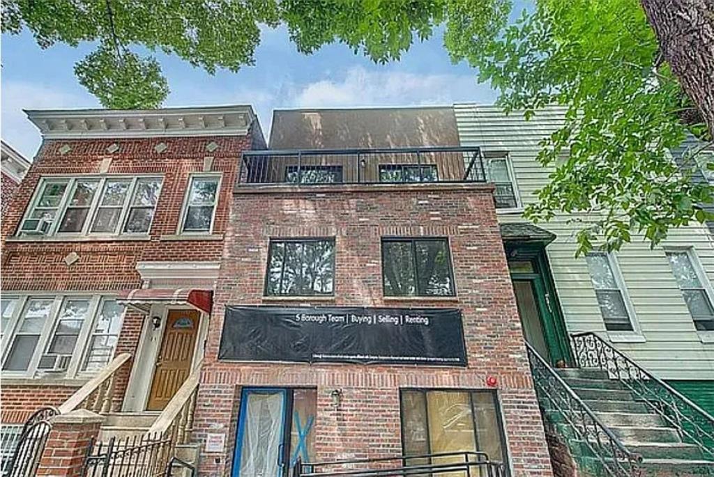 1115 Hancock Street Brooklyn, NY 11221 - Photo 14 of 33 an aerial view of a house with a yard
