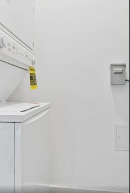 1115 Hancock Street Brooklyn, NY 11221 - Photo 18 of 33 a bathroom with a bathtub and a shower