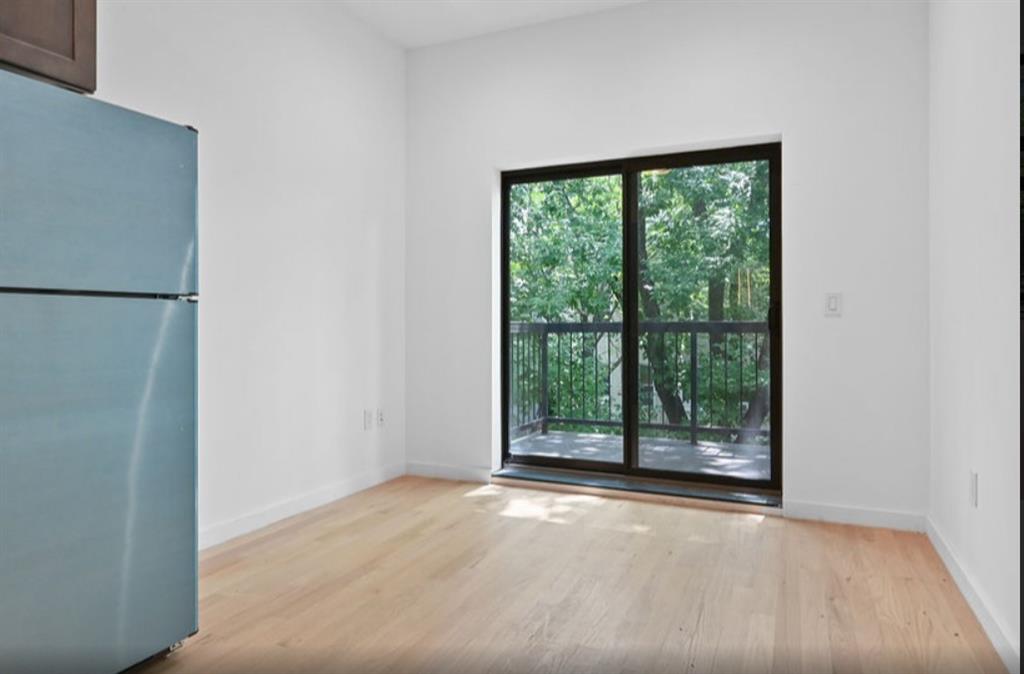 1115 Hancock Street Brooklyn, NY 11221 - Photo 23 of 33 a view of a room with a large window