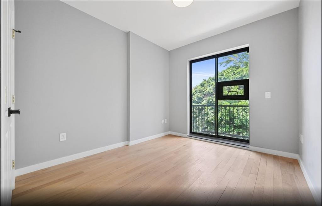 1115 Hancock Street Brooklyn, NY 11221 - Photo 3 of 33 a view of an empty room with a window