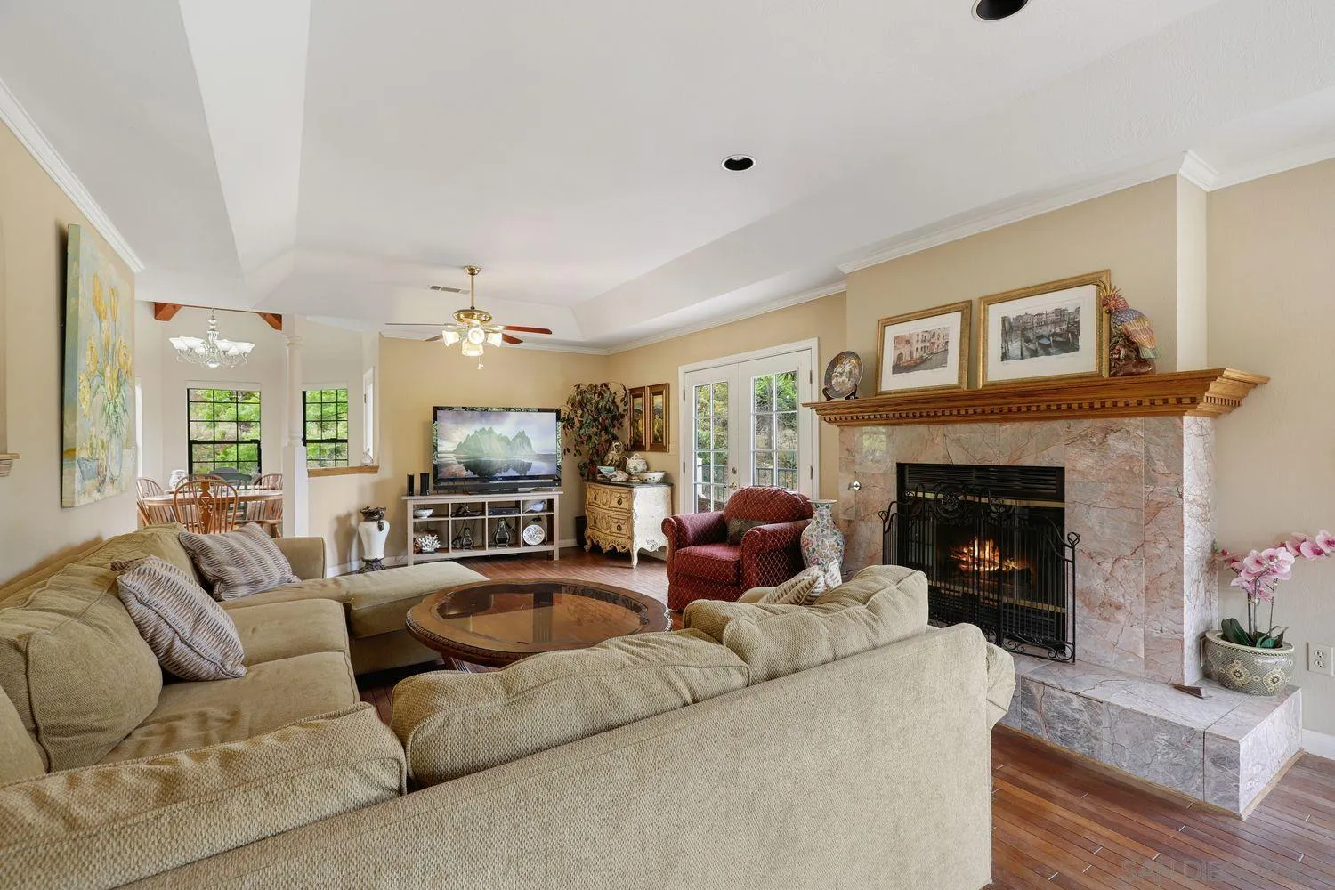 3944 Pala Mesa Drive Fallbrook, CA 92028 - Photo 11 of 39 a living room with furniture fireplace and a large window