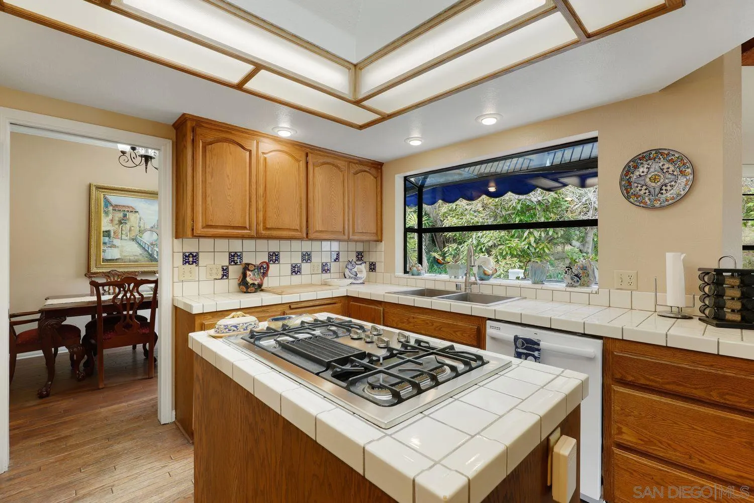 3944 Pala Mesa Drive Fallbrook, CA 92028 - Photo 15 of 39 a kitchen with stainless steel appliances a stove a sink and a refrigerator