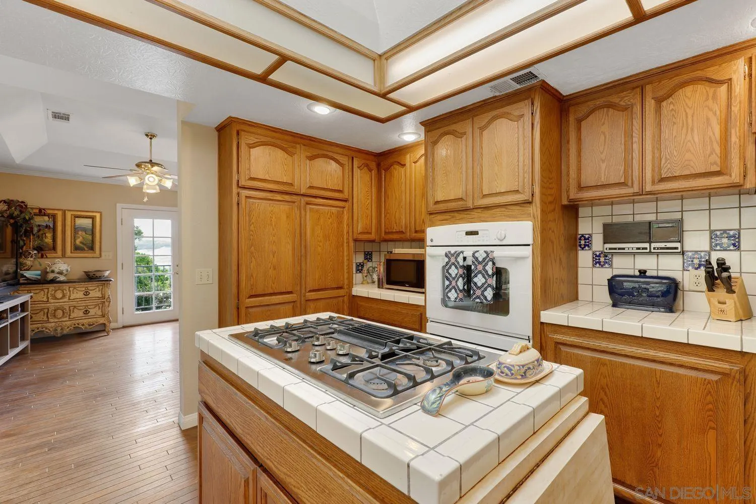 3944 Pala Mesa Drive Fallbrook, CA 92028 - Photo 17 of 39 a kitchen with a stove and a refrigerator