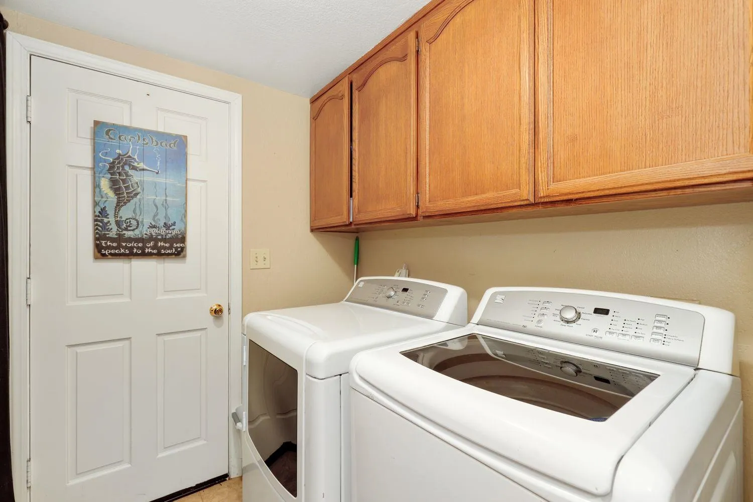 3944 Pala Mesa Drive Fallbrook, CA 92028 - Photo 28 of 39 a view of storage and utility room with washer and dryer