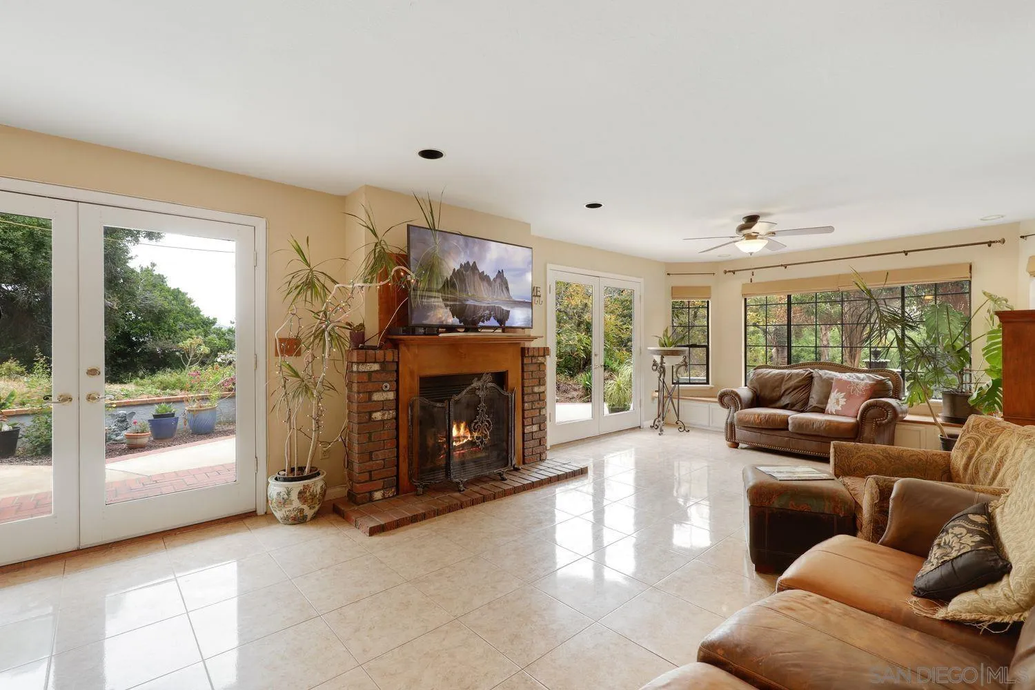3944 Pala Mesa Drive Fallbrook, CA 92028 - Photo 6 of 39 a living room with furniture and a fireplace