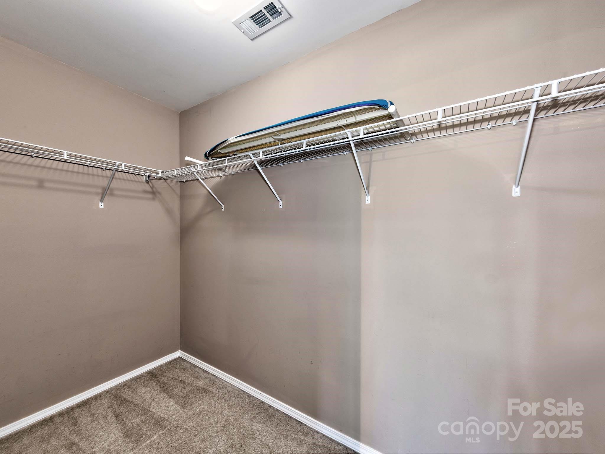290 River Clay Road Fort Mill, SC 29708 - Photo 20 of 41 a view of a room with racks on the wall
