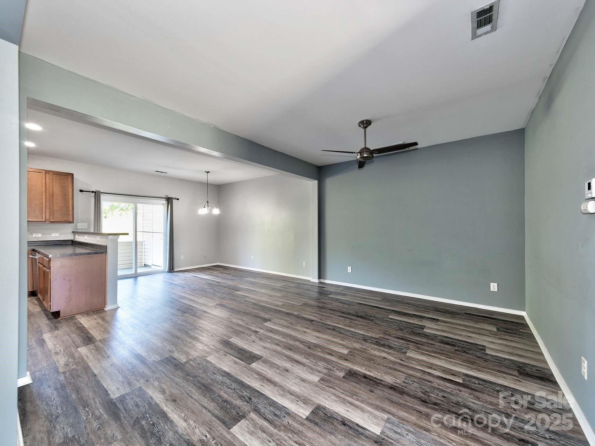 290 River Clay Road Fort Mill, SC 29708 - Photo 7 of 41 wooden floor in an empty room with a window