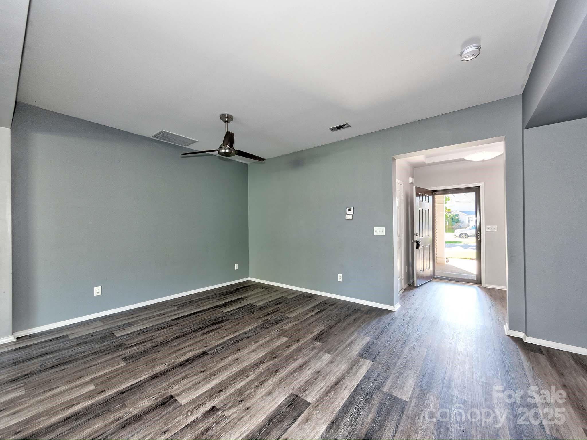290 River Clay Road Fort Mill, SC 29708 - Photo 10 of 41 wooden floor in an empty room with a window