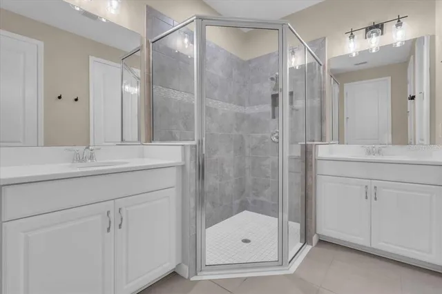 a bedroom with a bed and a cabinets