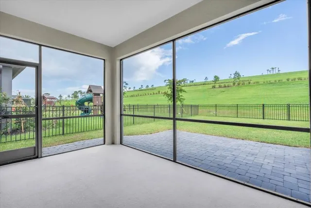 a view of a lake with a yard