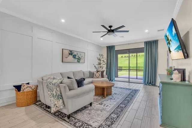 a kitchen with granite countertop a sink a stove and a refrigerator