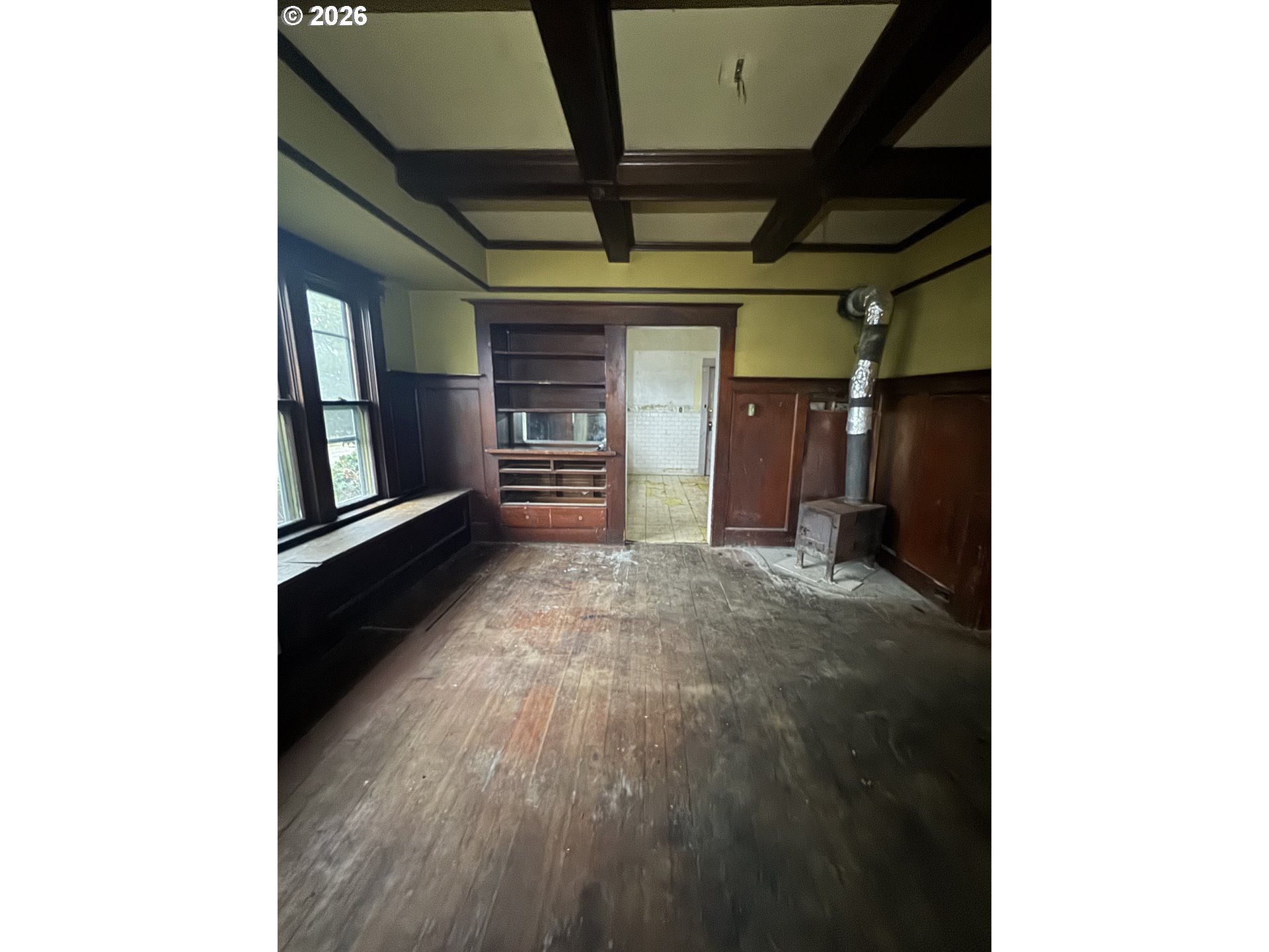 6422 Southeast Carlton Street Portland, OR 97206 - Photo 15 of 27 a view of empty room with wooden floor