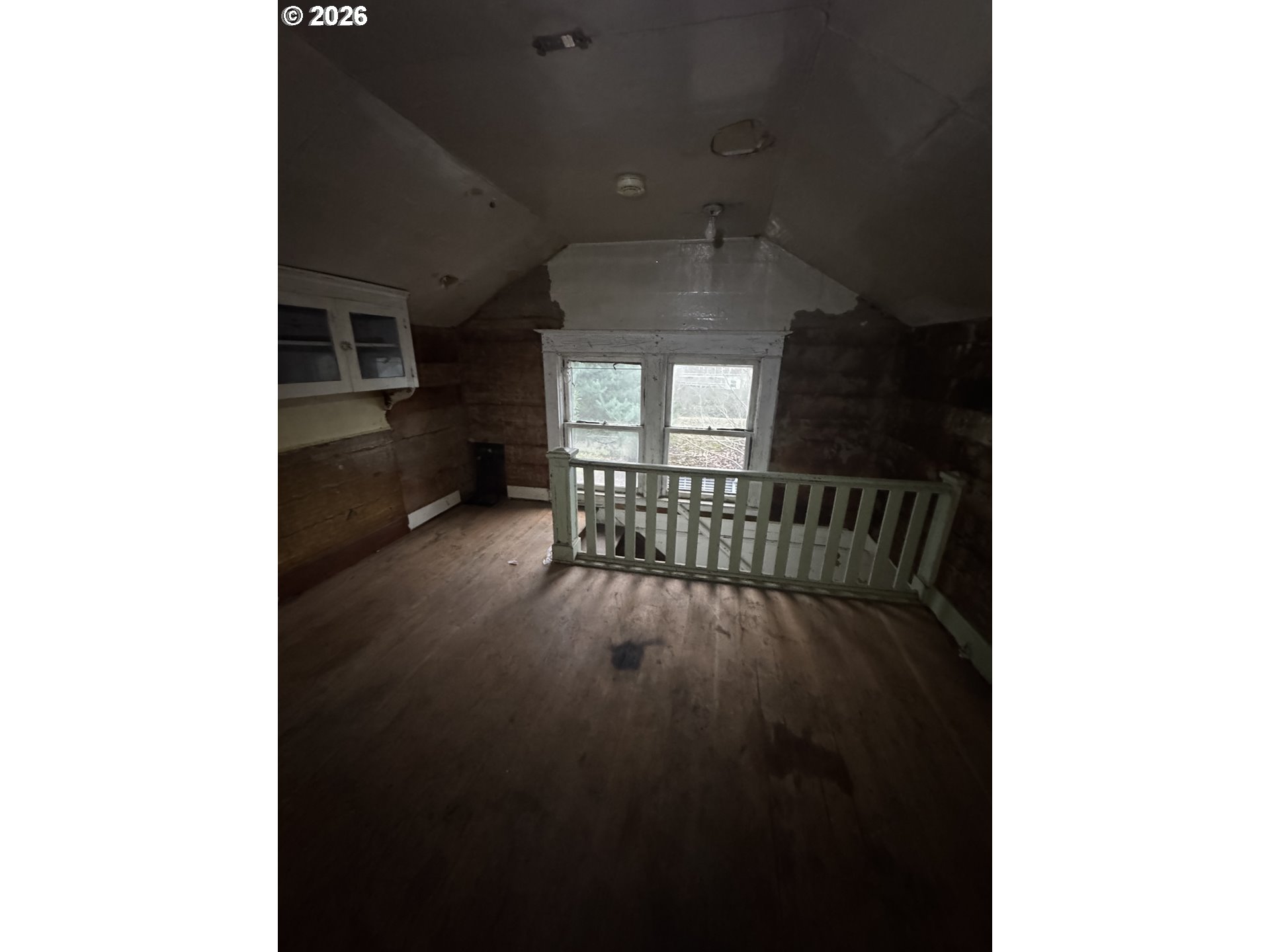 6422 Southeast Carlton Street Portland, OR 97206 - Photo 24 of 27 a view of an empty room with a window