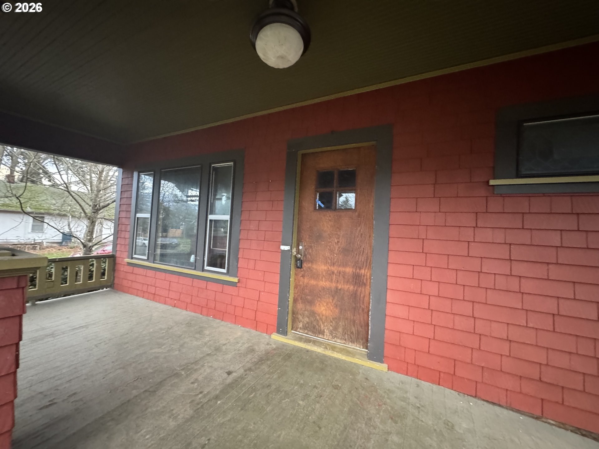 6422 Southeast Carlton Street Portland, OR 97206 - Photo 3 of 27 a view of a livingroom with an empty space and balcony